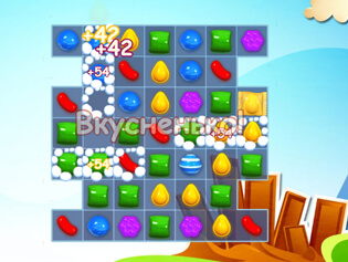 A detail from the online game Candy Crush Saga is shown on a
